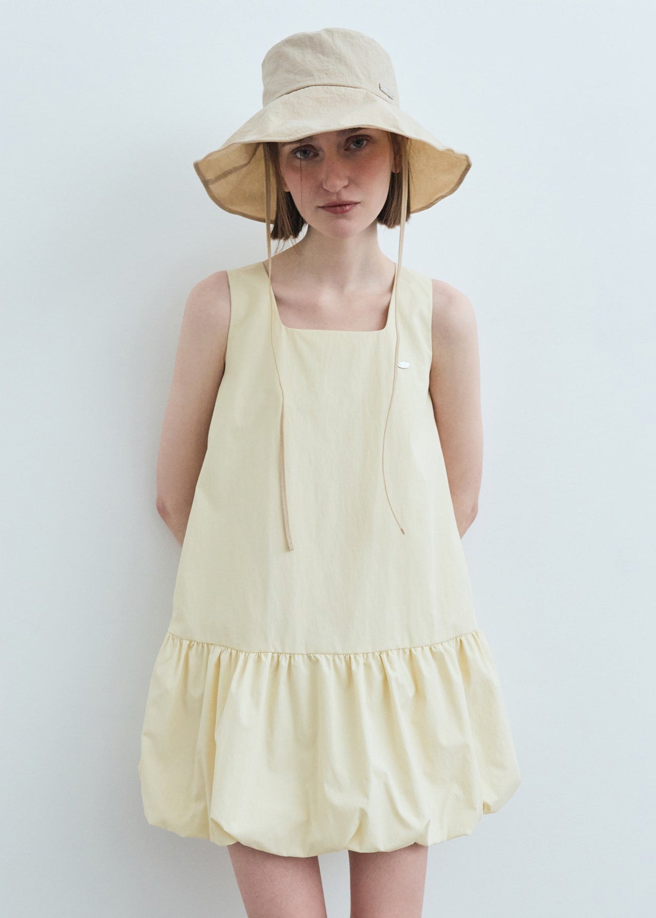 W BUBBLE HEM SLEEVELESS DRESS
