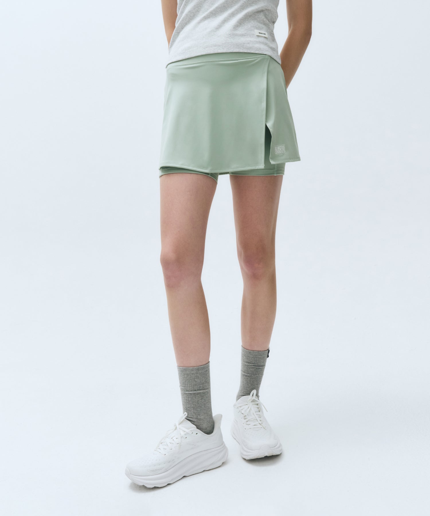MOUVEMENT W CLASSIC LOGO WRAP SKIRTS SHORTS